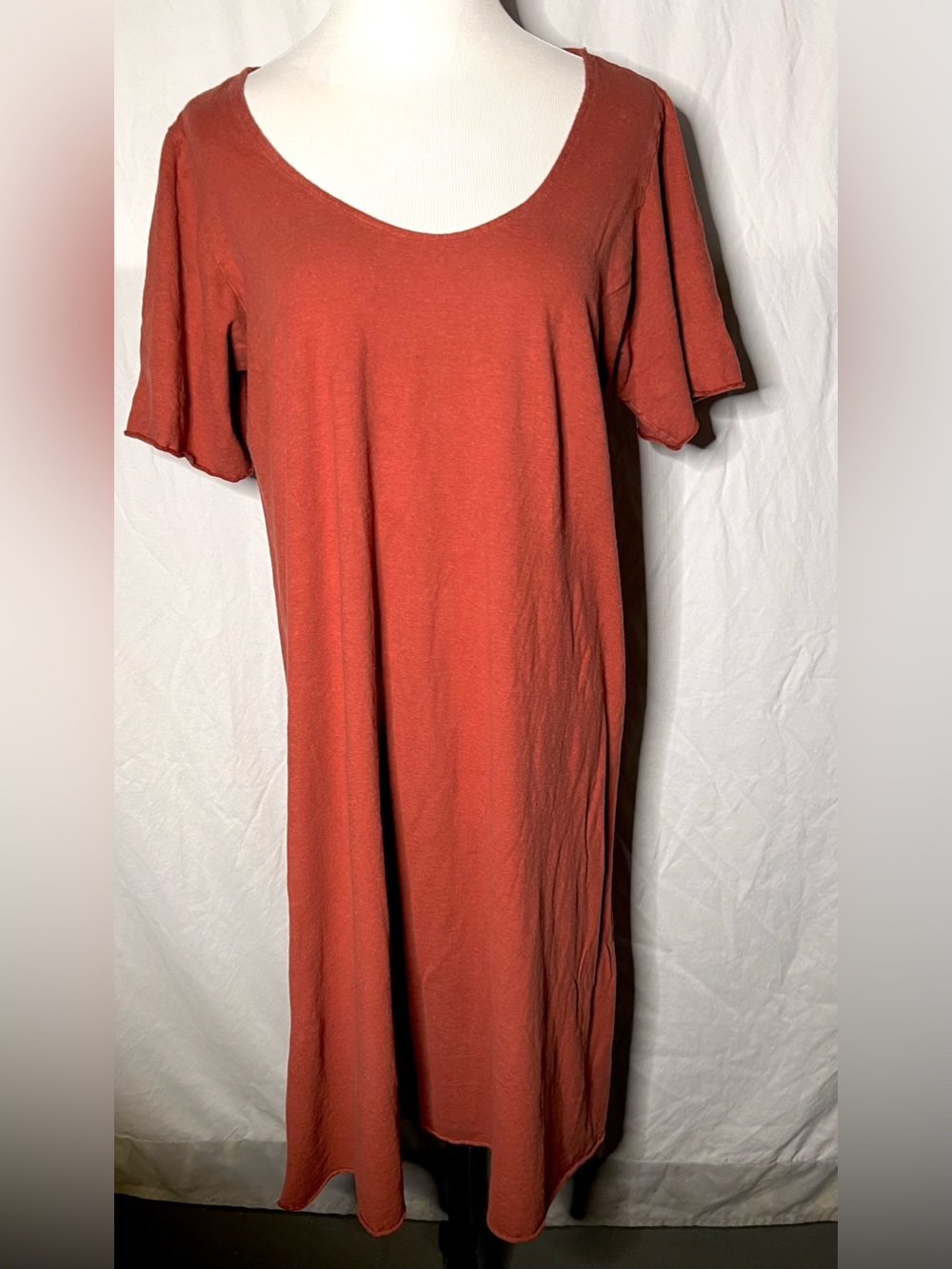 Organic cotton V-neck orange brown dress.
